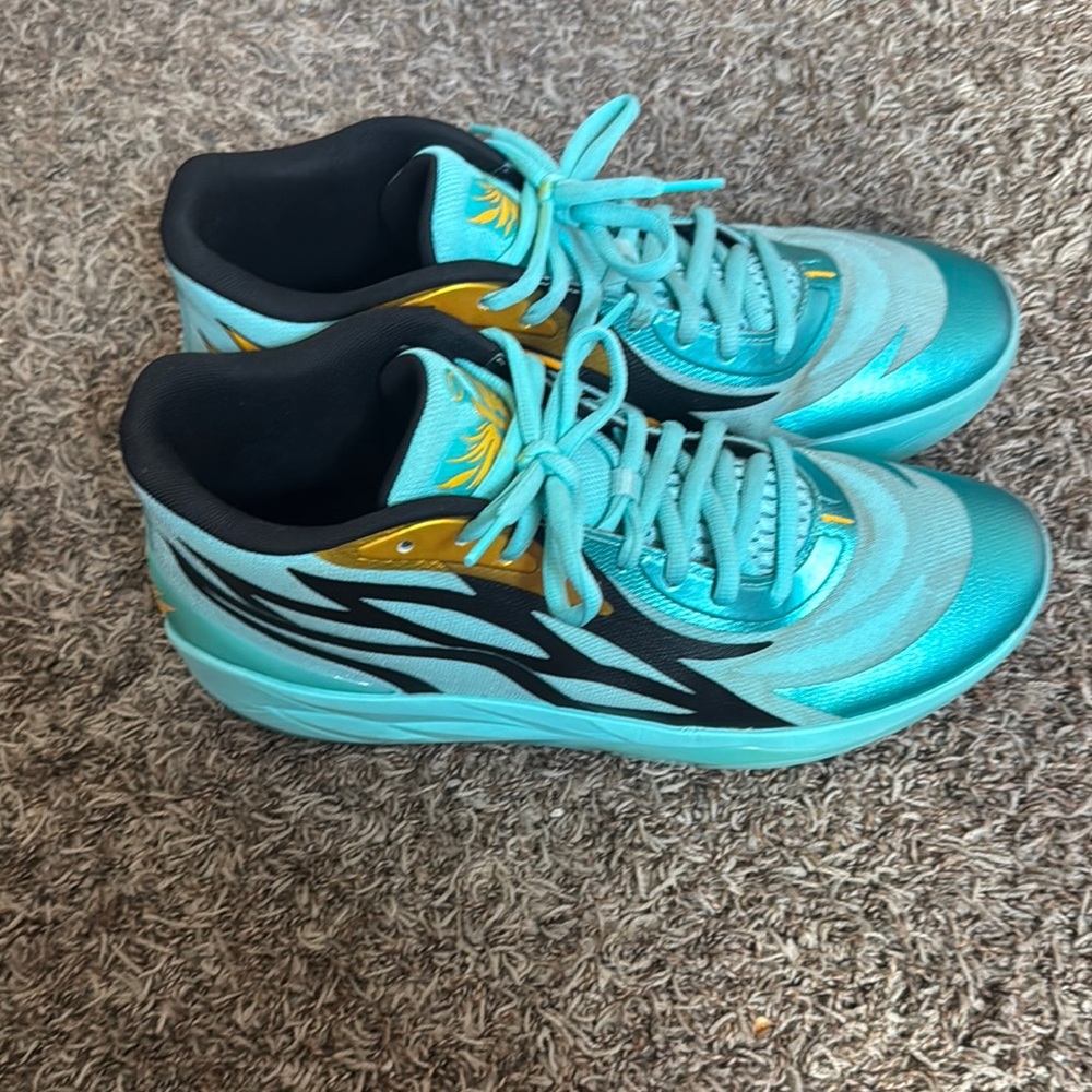 Puma Turquoise and Black Sneakers